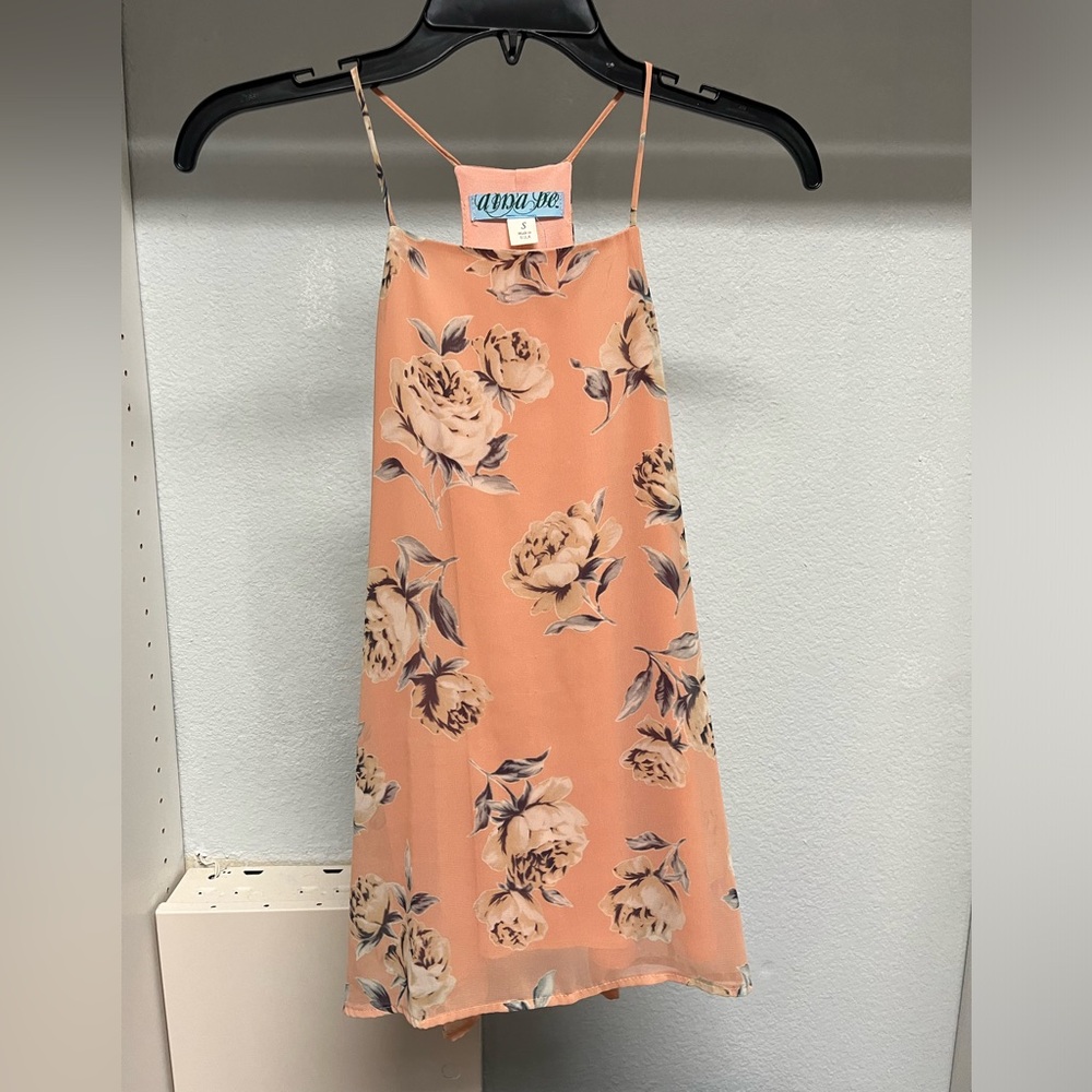 Pink floral sleeveless shirt